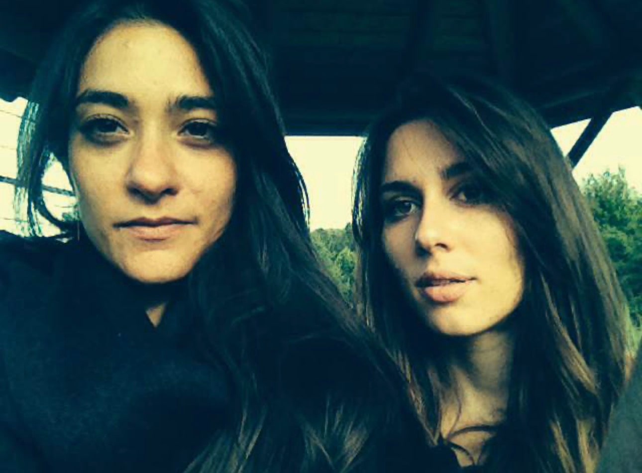 Daniela and Paola pose together in a photograph from their youth.