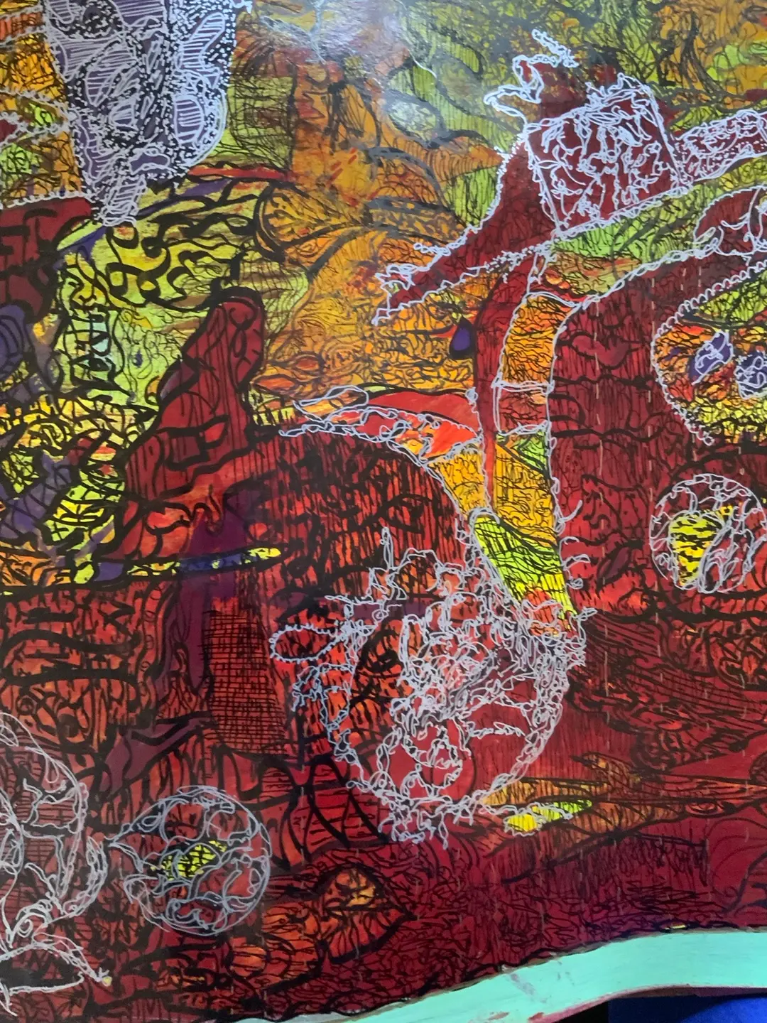 Detail 1 of one original artwork by Haci Sami Yaman. Red and orange forms, black linear registers and white looping marks. Complete work approximately 200 × 78 cm; these are not the dimensions of this detail. Photograph supplied by the artist.